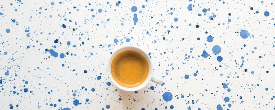 Cup of coffee on abstract background. Flat lay Stock Photos