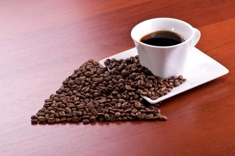 Cup of coffee and arrow Stock Photos