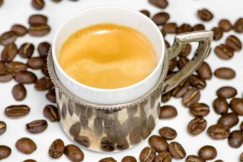 Cup of coffee and beans at backrounds Stock-Fotos