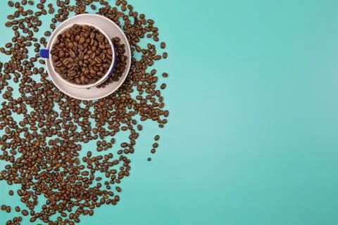 Cup Of Coffee And Beans With Text Space Stock Photos