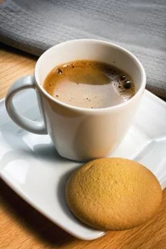 Cup of coffee and biscotti Stock Photos
