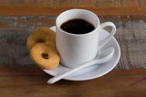 Cup of Coffee and Biscuits Stock Photos