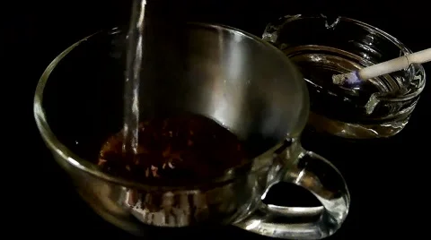 Cup of coffee and a cigarette in an ashtray Stock Footage 47240648
