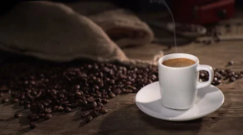 Cup of coffee and coffe beans Stock Footage 62836156