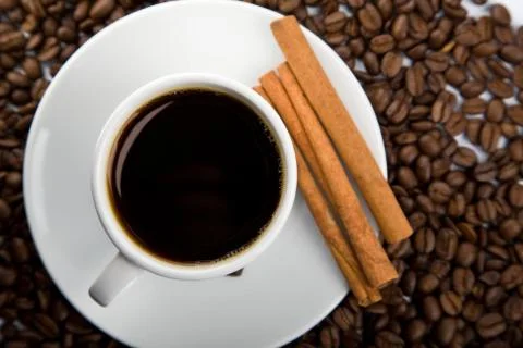 Cup of coffee and coffee beans Stock Photos