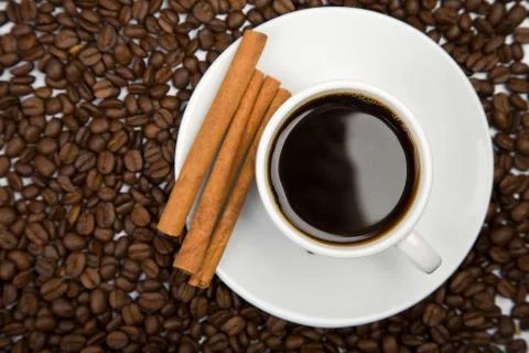 Cup of coffee and coffee beans Stock Photos