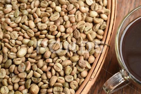 Cup of coffee and coffee beans Stock Photos