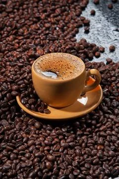 Cup Of Coffee And Coffee Beans Stock Photos