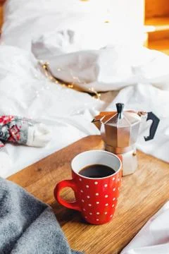 Cup of coffee and coffee maker on wooden tra Stock Photos