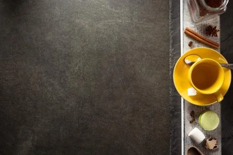 Cup of coffee and ingredients on table Stock Photos