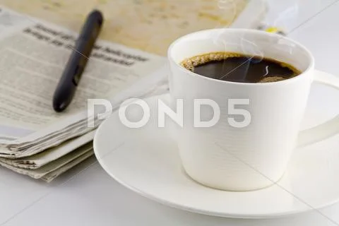 A cup of coffee and a newspaper Stock Illustration