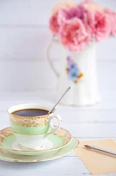 A cup of coffee and a pause to write a list Stock Photos