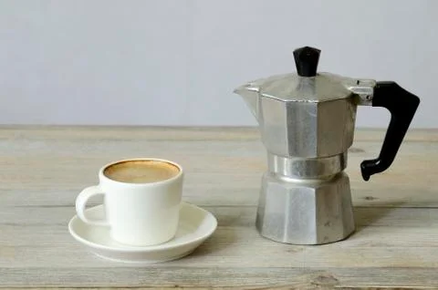 Cup of coffee and percolator Stock Photos