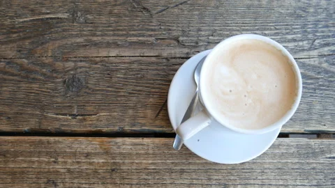 A cup of coffee and a piece of cake. Stock Footage 86202463