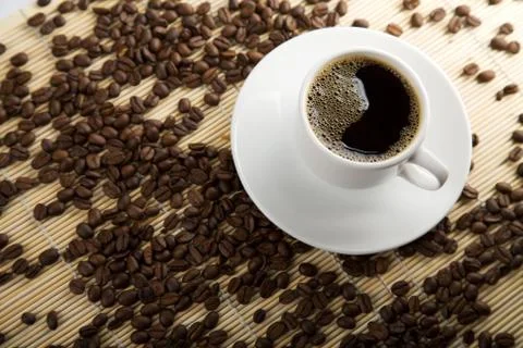 Cup of coffee and roasted beans Foto stock