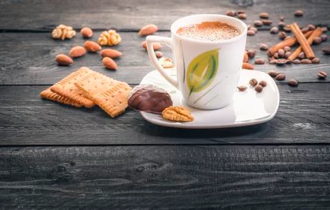 Cup of coffee and snacks Stock Photos