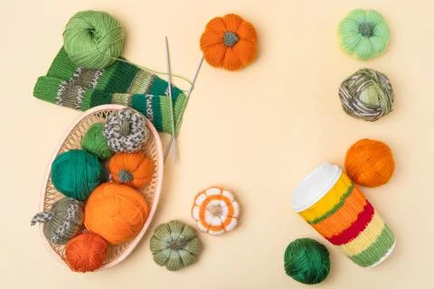 Cup coffee and wool with knitting needles Stock Photos