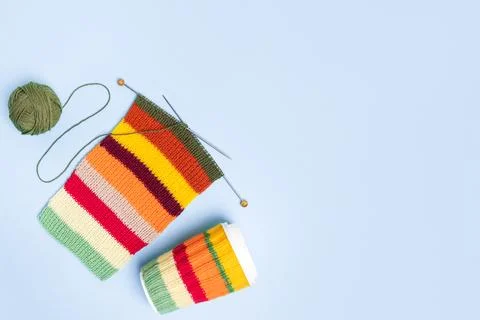 Cup coffee and wool with knitting needles Stock Photos