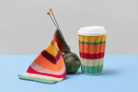 Cup coffee and wool with knitting needles Stock Photos