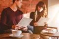 The cup of coffee on the background of the couple Photo