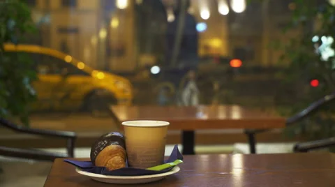 Cup of coffee on the background of night city Stock Footage 68620705
