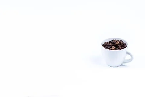 Cup with coffee bean on white Stock Photos