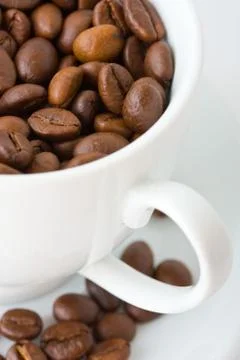 Cup coffee beans background Stock Photos