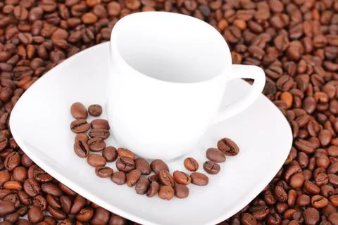 Cup in coffee beans 写真素材