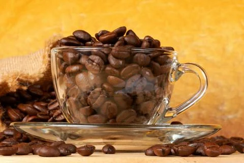 Cup of coffee beans Stock Photos