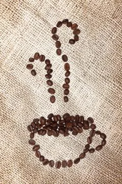 Cup of coffee beans Stock Photos