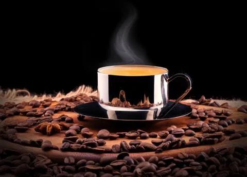 Cup of Coffee with beans Stock Photos