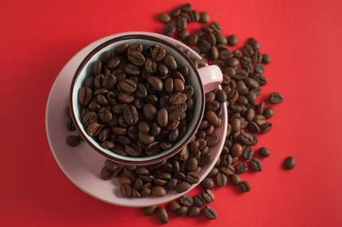 Cup of coffee beans Stock Photos