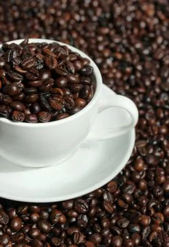Cup of coffee beans Stock Photos