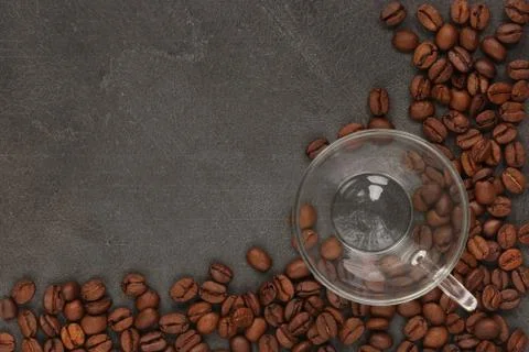 Cup of coffee on beans Stock Photos