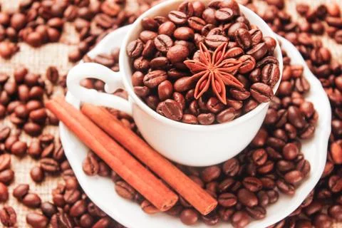 Cup with coffee beans Stock Photos