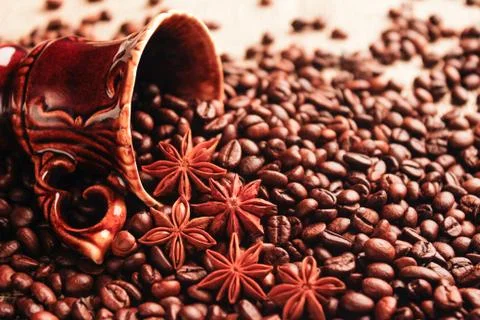 Cup with coffee beans Stock Photos