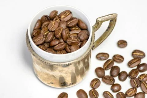 Cup of coffee beans Stock Photos