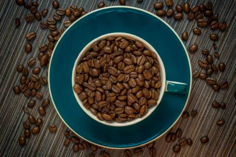 Cup of coffee beans Stock Photos