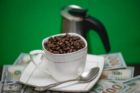 Cup with coffee beans Stock Photos