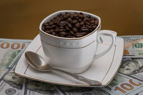 Cup with coffee beans Stock Photos
