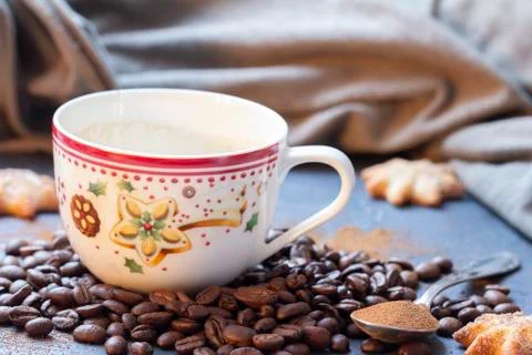 Cup with coffee beans Stock Photos
