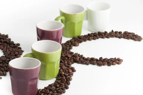 Cup of coffee with beans Stock Photos