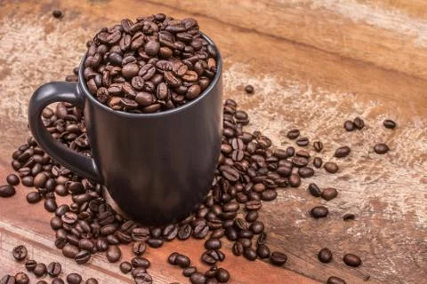 Cup of Coffee beans Stock Photos