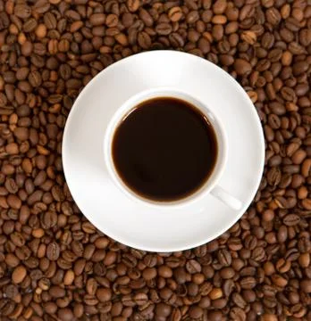 Cup of coffee on beans Stockfoto's