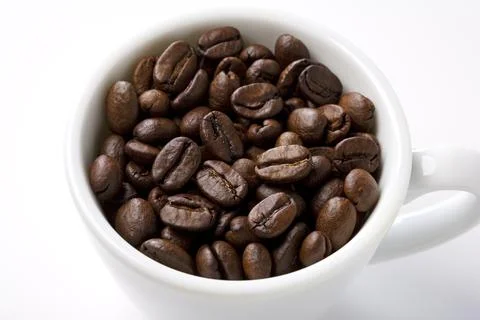 Cup of Coffee Beans Stock Photos