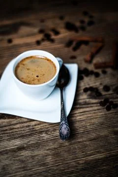 Cup with coffee beans Stock Photos