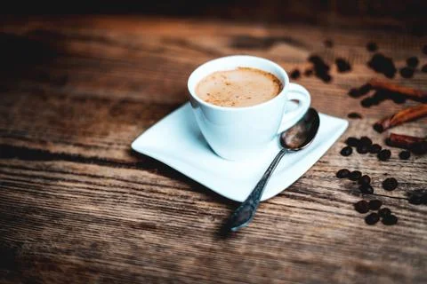 Cup with coffee beans Stock Photos