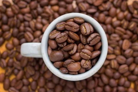 Cup with coffee beans - top Stock Photos