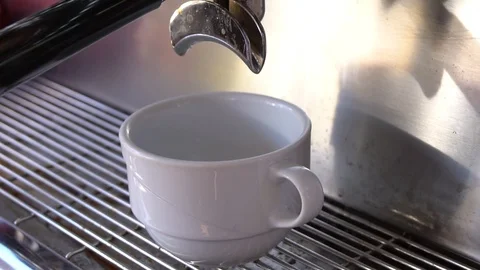 Cup Of Coffee Being Poured From A Professional Espresso Machine. Vidéo 105809203