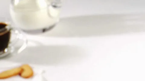 A cup of coffee with biscuits Stock Footage 8571115